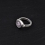 Női ezüst gyűrű cirkóniummal  "Misztikus csomó"